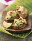 Crab and avocado toasts — Stock Photo