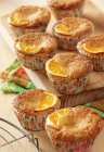 Deveral orange and semolina muffins — Stock Photo