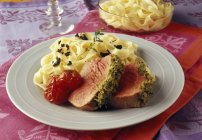 Roasted beef with taglatelle pasta — Stock Photo
