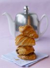 Teapot and viennoiserie pastry — Stock Photo