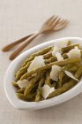 Asparagus with parmesan flakes — Stock Photo