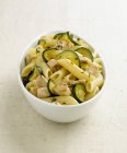 Penne pasta with rabbit and zucchini — Stock Photo