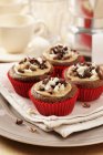 Mocha chestnut cupcakes on cream napkin — Stock Photo