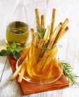 Gressini breadsticks in cup — Stock Photo