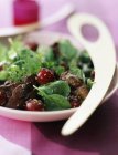 Mesclun with poultry liver and cherry salad — Stock Photo