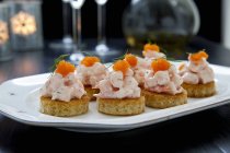 Closeup view of canapes with shrimp and bleak roe — Stock Photo