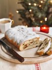 Partly sliced christmas Stollen — Stock Photo