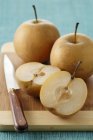 Fresh Nachis pears with halves — Stock Photo