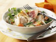 Closeup view of seafood Blanquette with vegetables — Stock Photo