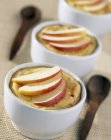Closeup view of apple and rum Flan in bowls — Stock Photo