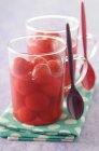 Cherries in syrup in glasses — Stock Photo