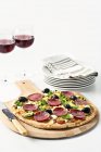 Pizza with salami and olives — Stock Photo