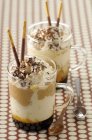 Coffee ice cream sundae with sticks — Stock Photo