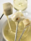 Cheese fondue in bowl — Stock Photo