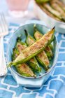 Fried Pea pods with cod — Stock Photo