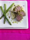 Rack of lamb with asparagus — Stock Photo