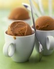 Coffee ice cream in cups — Stock Photo