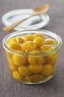 Mirabelle plums in syrup — Stock Photo