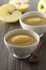 Closeup view of apple sauce in white bowls — Stock Photo