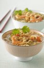 Noodles with shrimp and peanut broth — Stock Photo
