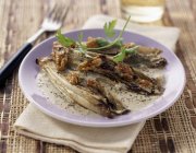Braised chicory with roquefort sauce — Stock Photo