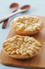 Baked Pine nut tartlets — Stock Photo