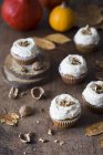 Pumpkin cupcakes with cream cheese — Stock Photo