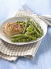 Pork fillet with green beans — Stock Photo