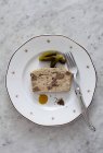 Chicken liver terrine with pickled gherkins — Stock Photo