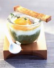 Coddled egg with green pepper — Stock Photo