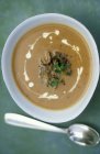 Cream of morel mushrooms soup with thyme — Stock Photo