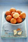 Fresh Tangerines in bowl — Stock Photo