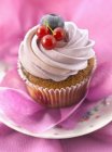Delicious cupcake with berries — Stock Photo
