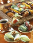 Assorted marzipan sweets on tray over table — Stock Photo