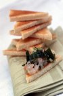 Toast triangles with shrimps — Stock Photo