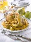 Stuffed capon with apples — Stock Photo