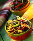 Closeup view of Tex Mex chili in colorful bowls — Stock Photo