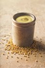 Grain mustard in pot — Stock Photo
