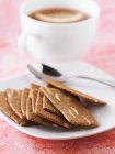 Thinly sliced almond cookies — Stock Photo