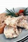 Closeup view of fish Rillette with bread and vegetables — Stock Photo