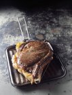Beef chop cooked in grill-pan — Stock Photo