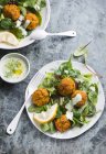 Portion of falafel serving with hummus — Stock Photo