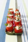 Small raw tomatoes with cream — Stock Photo