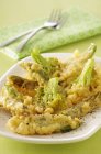 Vegetable tempuras on plate — Stock Photo