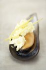 Mussel with butter and ginger — Stock Photo