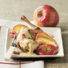 Rabbit with apples and sauce — Stock Photo