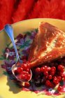 Closeup view of galettes with berries and spoon — Stock Photo