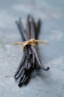 Стакан стручков ванили — стоковое фото