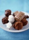 Dish of different chocolate — Stock Photo