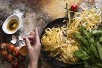 Tagliatelle pasta with tomatoes — Stock Photo